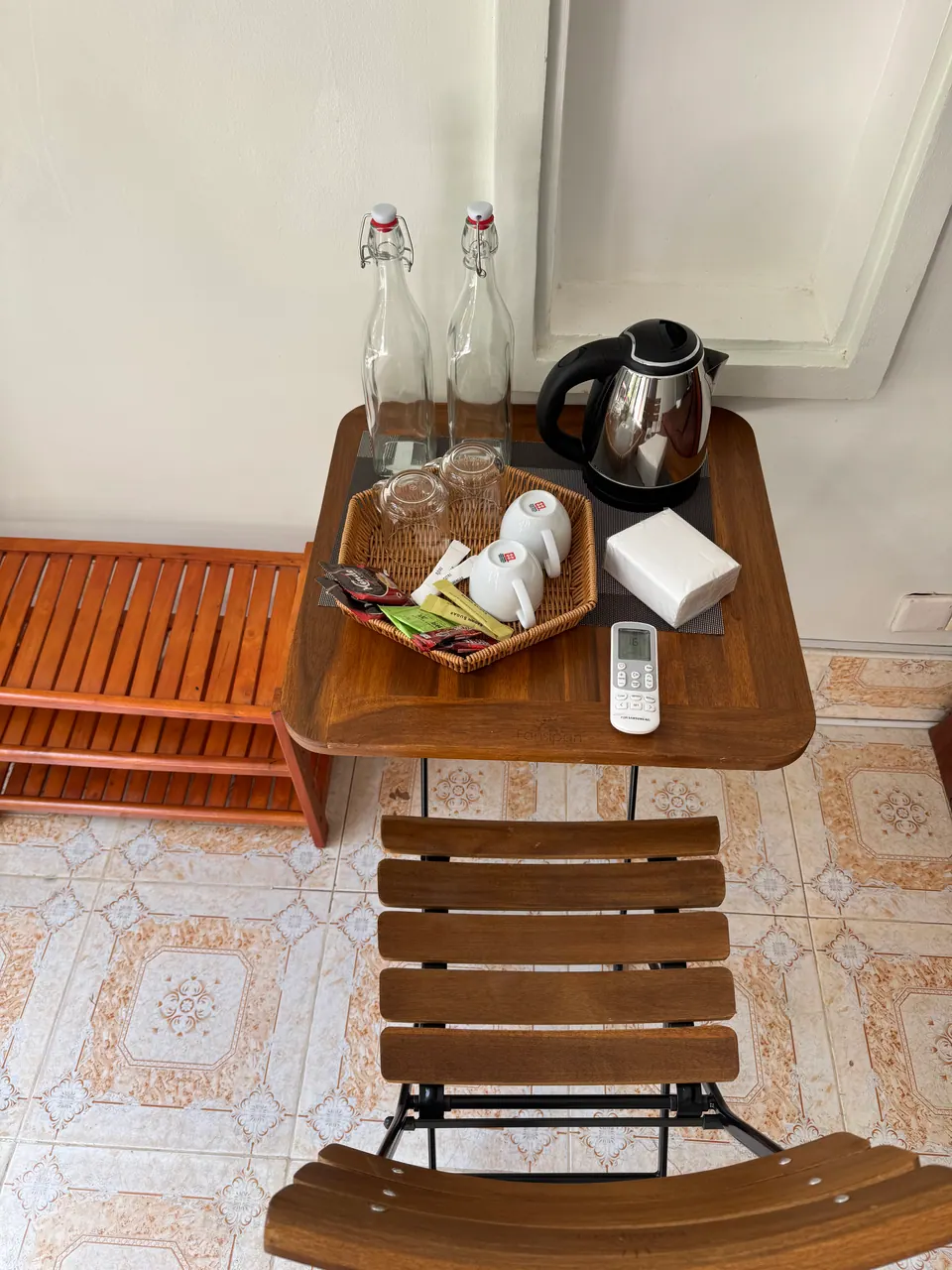 Kettle, cups and coffee on the tea table